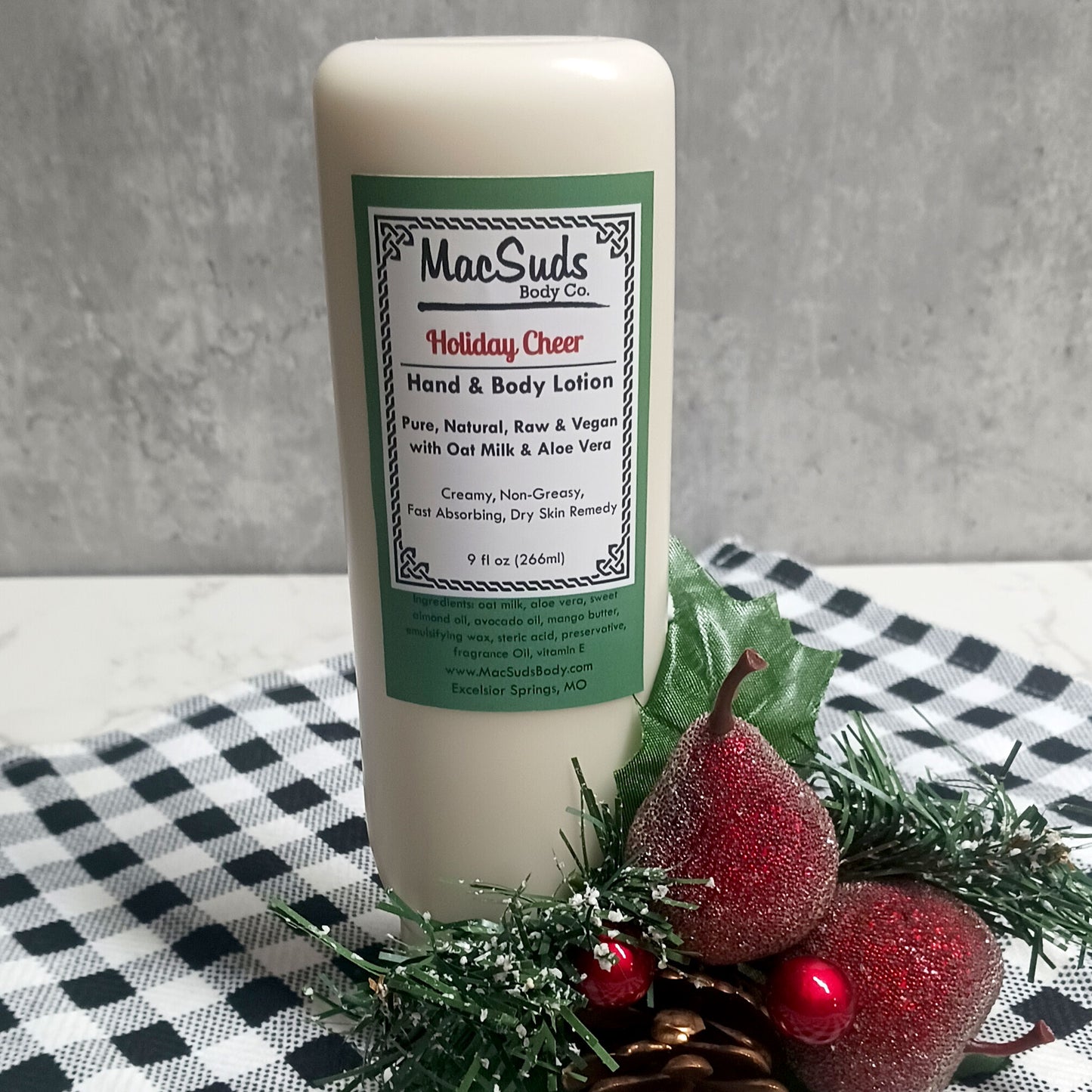 Handmade Holiday Cheer Lotion in a 9 oz upside-down bottle, rich moisturizing lotion with peppermint, vanilla, marshmallow, and sugar crystal scent.