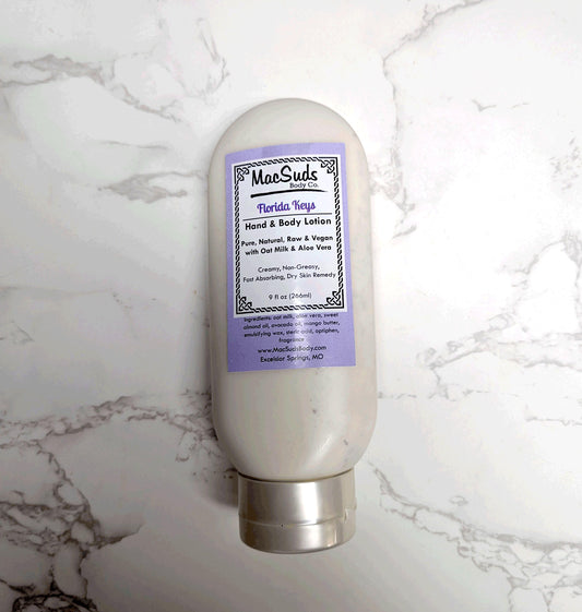 Handmade Florida Keys Lotion in a 9 oz upside-down bottle, moisturizing body lotion with a clean coastal scent of spiced citrus, island woods, and vanilla.
